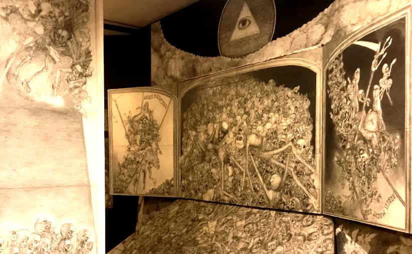 Huge drawings full of human bones by Marian Kołodziej, an Auschwitz survivor, at the permanent exhibition in Harmęże.