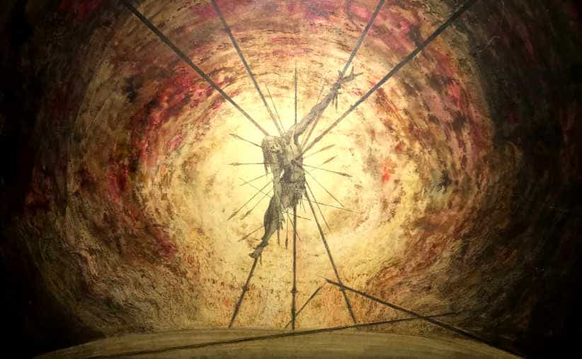 A piece of art with a pierced man by Marian Kołodziej, an Auschwitz survivor, at the permanent exhibition in Harmęże.