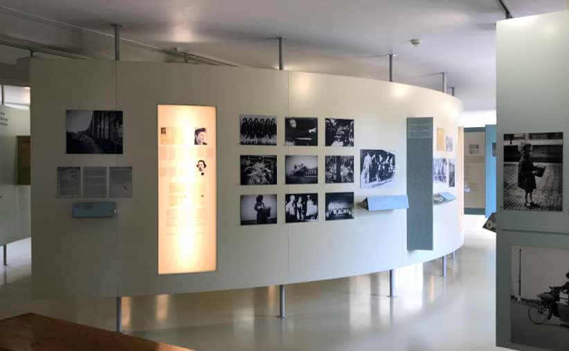 Display walls with photos of people from Netherlands connected to the Auschwitz history in Block 21: Dutch national exhibition.