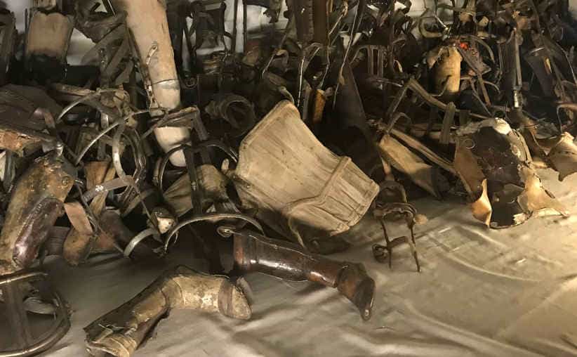 The belongings of the disabled transported to the camp in Block 5, Auschwitz I Main Camp