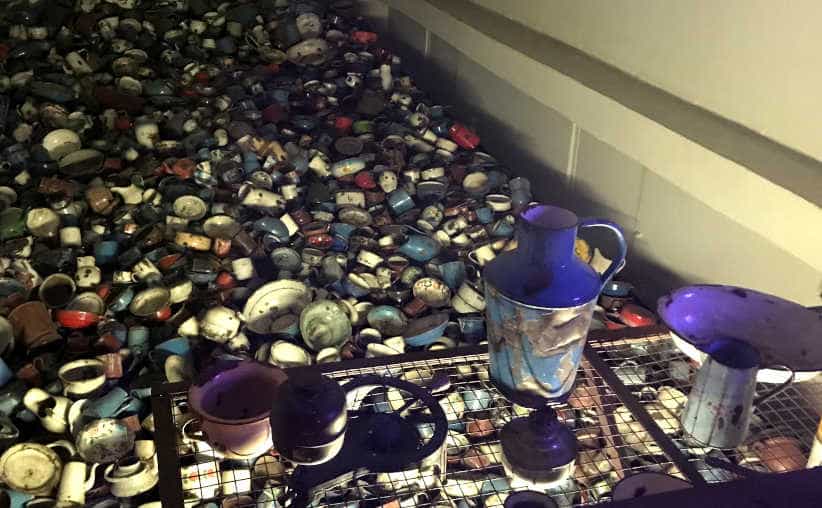 Metal pots of Auschwitz deportees in Block 5, Auschwitz I Main Camp