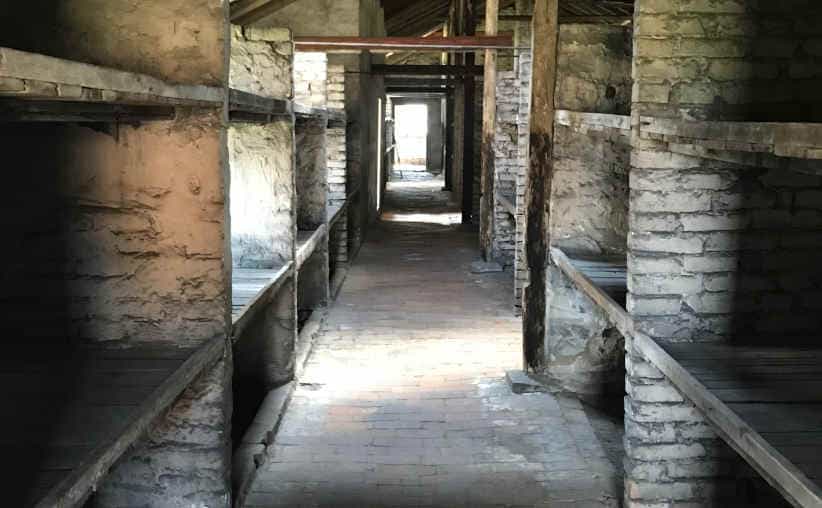 Corridor and prisoners' beds in a brick barrack at Auschwitz-II-Birkenau, sector BIa.