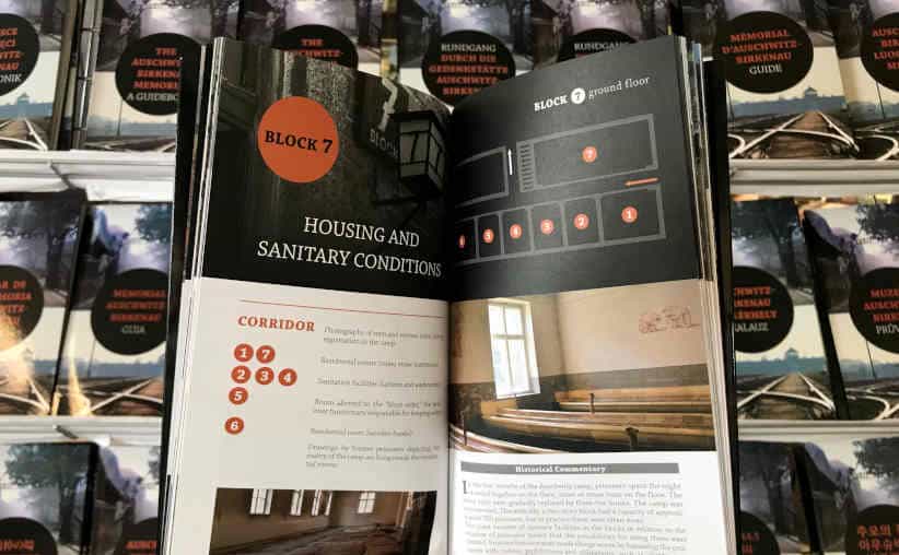 Auschwitz Museum official guidebook opened at the page with Block 7