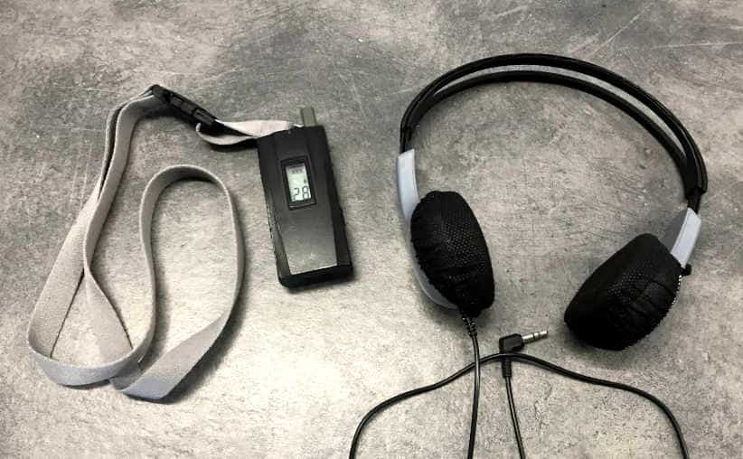 A small radio and headphones used to hear the guide’s narration at Auschwitz I exhibition.